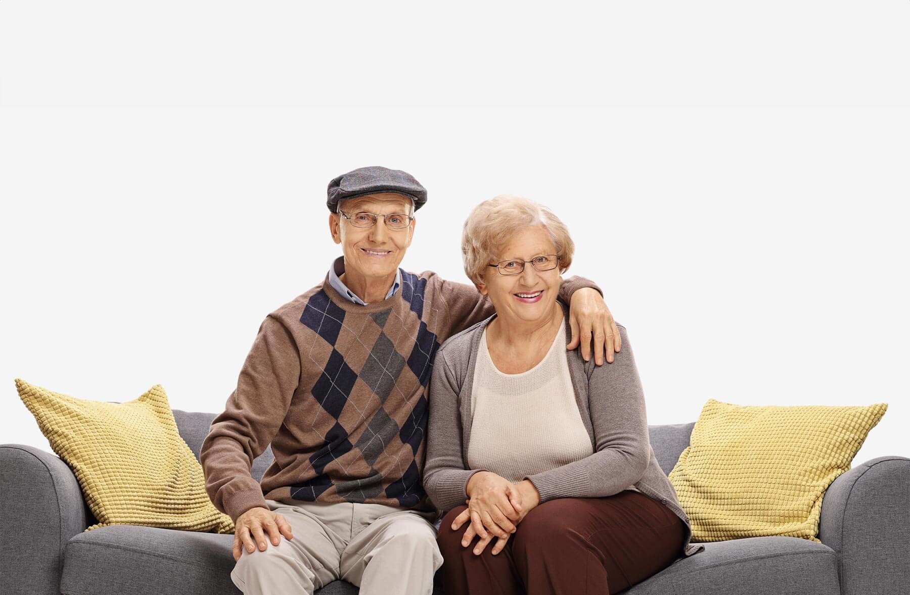 Senior couple on couch in need of elder law attorney