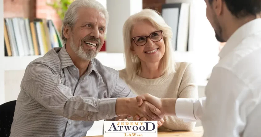 client shaking attorneys hand